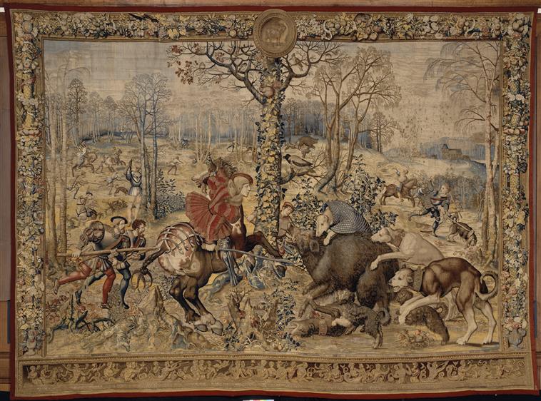 A tapestry 'The month of December, capricorn: attack of the wild boar' from the series 'The Hunting of Maximilian' called 'Beautiful hunts of Guise', cr. 1530, after Bernard van Orley, Brussels, Flanders