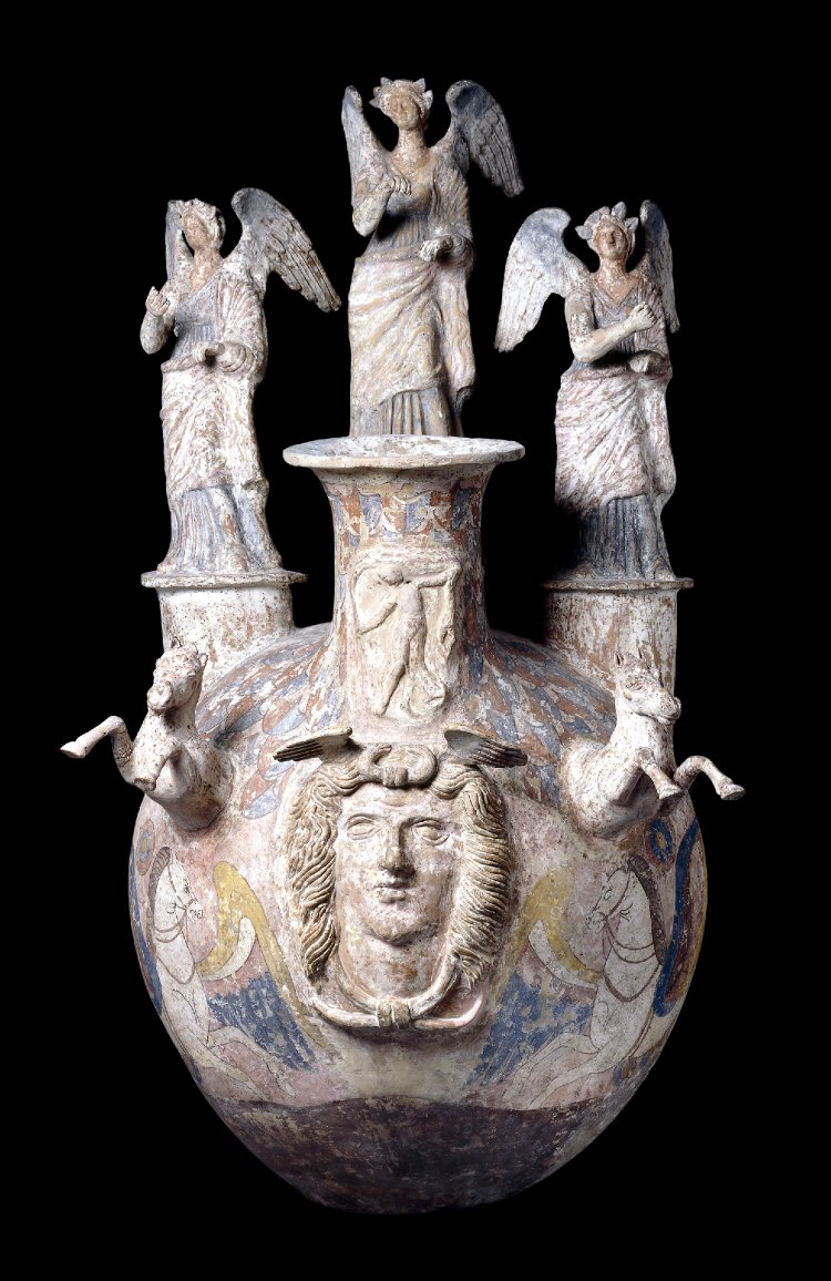 COMPARANDUM: Askos with with three terracotta Nikai, the foreparts of two horses, reliefs showing the head of Medusa and a dancing maenad, cr. 270-200 BC, Canosa, Apulia, Italy