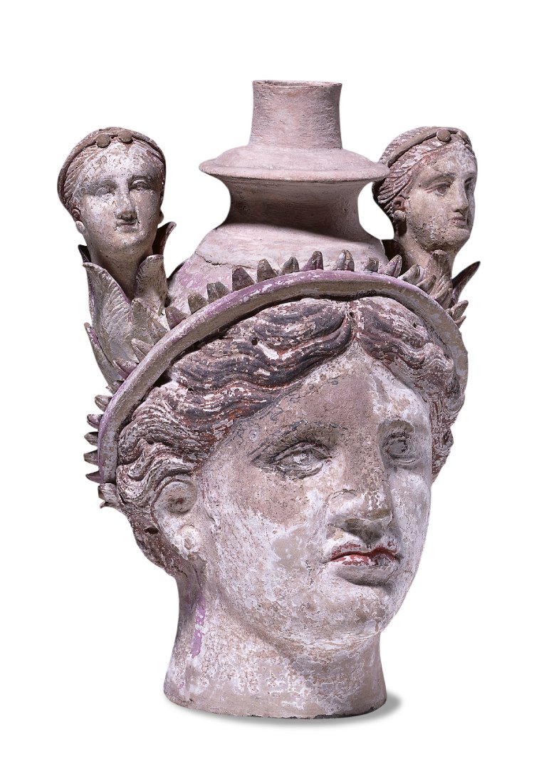 COMPARANDUM: Terracotta female head partially imitating a vase (lekythos), 325-300BC, Canosa, Apulia, Italy