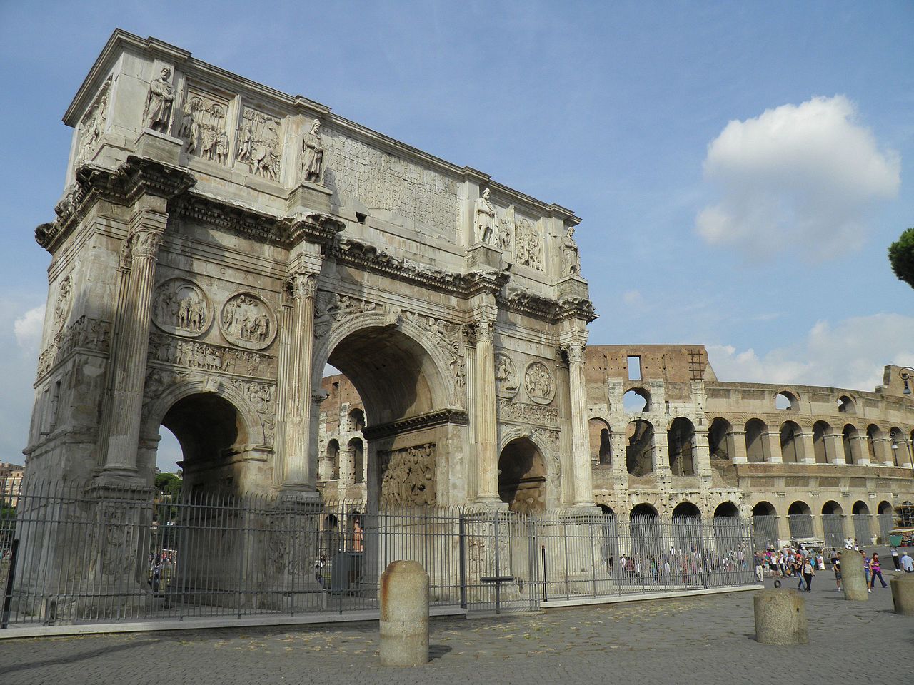 Arch of Constantine and Colosseum in the background, 315, Rome
