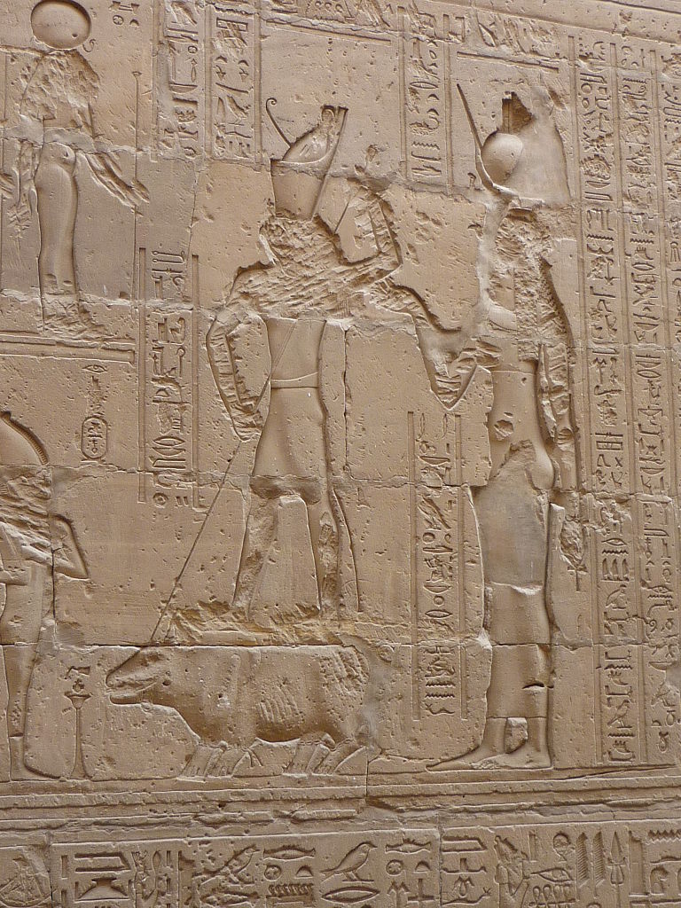 COMPARANDUM: Wall relief of fight between Set and Horus where Horus spears Set (hippopotamus), 237 BC - 57 BC, Temple of Edfu, Egypt